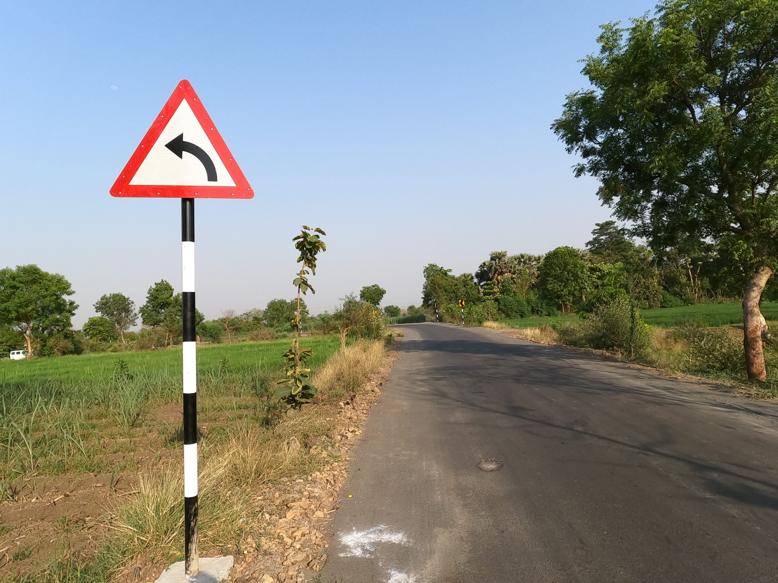 The Unseen Danger: Interpreting the Sharp Left Curve Sign on Rural Roads
